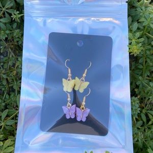 2 pairs of butterfly earrings